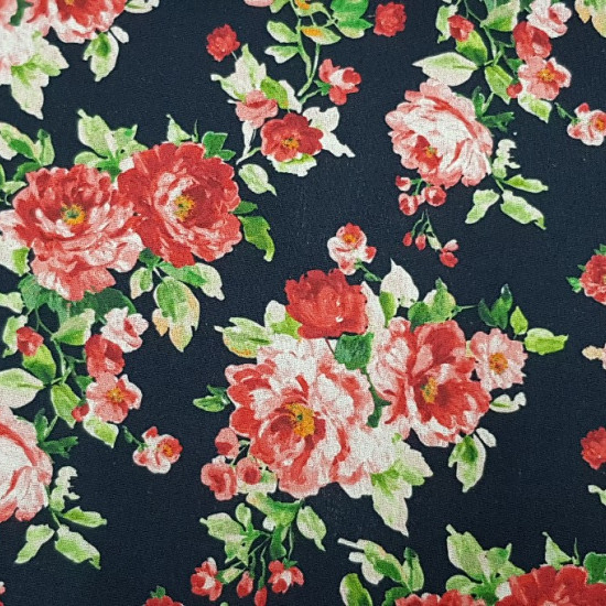 Cotton Cretonne Catalan Flowers Red fabric - Typical Catalan cretonne fabric. It is a flowered fabric on a black background in which red colors predominate. The fabric is 140cm wide and its composition 100% cotton