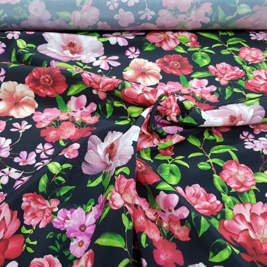 Crepe Flowers Black Background fabric - Koshibo-type crepe fabric with flower drawings on a black background. The fabric is 150cm wide and its composition is 100% polyester.