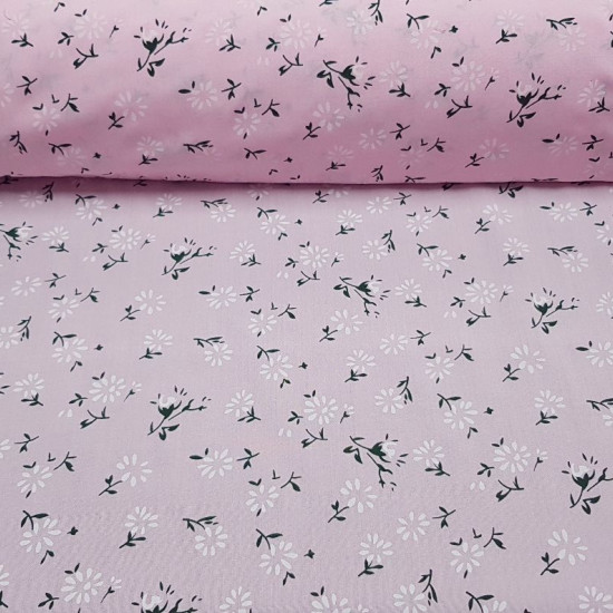 Fine Cotton Flowers Pink fabric - Fine cotton bed sheet-like fabric with dandelion-like flower patterns on a light pink background. The fabric is 150cm wide and its composition is 100% cotton.