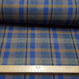 Wool Check Liverpool Blue Brown fabric - Wool fabric with Scottish plaid or tartan pattern Liverpool style in blue and brown tones with dark stripes. Wool fabric made in Spain. The fabric measures 140cm wide and its composition 65% polyester - 35% wool