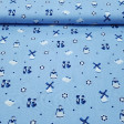 OUTLET Cotton Holland Mills fabric - Cotton fabric with Dutch-themed drawings, in which we find mills, wooden clogs, typical Dutch dress characters, flowers and moles on a blue background.