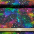 Digital Cotton Speckled Galaxy fabric - Cotton fabric in digital print with multicolored galactic themed drawings on a black background. The fabric is 150cm wide and its composition 100% cotton.