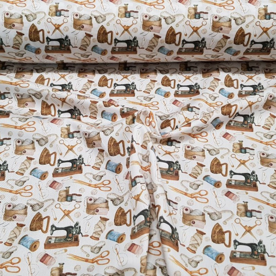 Cotton Vintage Sewing fabric - Satin cotton fabric with vintage drawings on a sewing theme, with sewing machines, scissors, needles, threads, irons... on a white background. The fabric is 140cm wide and its composition is 100% cotton.