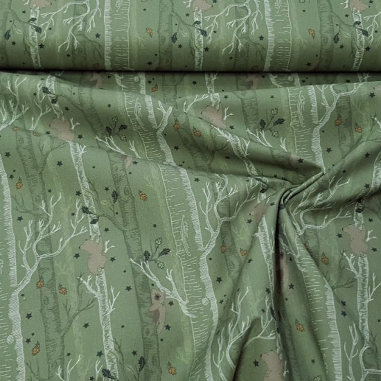 Cotton Autumn Trees Leaves Stars fabric - Organic cotton fabric with drawings of trees with bears on the branches, where you can see leaves and stars falling from the trees. The fabric is 150cm wide and its composition is 100% cotton.