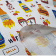 Cotton Spicy Sauces fabric - Organic cotton fabric with drawings of containers of hot sauces such as tabasco, barbecue sauce, among others... on a white background. The fabric is 150cm wide and its composition is 100% cotton.