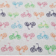 Tela Algodón Bicicletas Colores - Tela de algodón infantil con dibujos de bicicletas de colores sobre un fondo blanco. La tela mide 150cm de ancho y su composición 100% algodón.