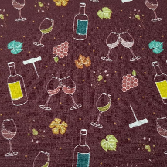 Cotton Wine Glasses fabric - Organic cotton fabric with drawings related to the world of wine, where drawings of crystal glasses, bunches of grapes, corkscrews... appear on a dark red background. The fabric is 150cm wide and its composition is 1