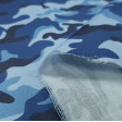 Cotton Camouflage Blue fabric - Satin cotton fabric with camouflage pattern in blue tones. The fabric is 140cm wide and its composition is 100% cotton.