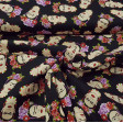 Cotton Frida Brown Background fabric - Cotton fabric with drawings of Frida Kahlo faces on a dark brown background. The fabric is 140cm wide and its composition is 100% cotton.