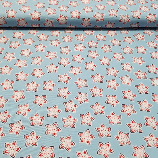 Cotton White Leaves Blue Background fabric - Cotton fabric with drawings of white and red leaves on a light blue background. This fabric is 100% Cotton and double width, ideal for Patchwork creations.