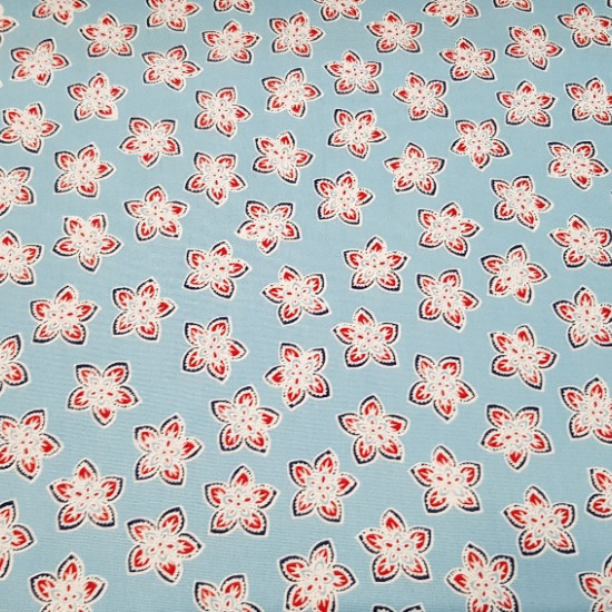 Cotton White Leaves Blue Background fabric - Cotton fabric with drawings of white and red leaves on a light blue background. This fabric is 100% Cotton and double width, ideal for Patchwork creations.