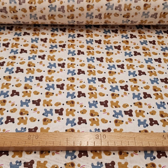 Cotton Figures Dogs fabric - This fabric combines figures of different dogs on a beige/cream background Its composition is 100% Cotton and the width of the fabric is 150cm Ideal fabric for making accessories and Patchwork crafts