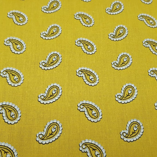 Cotton Yellow Cashmere fabric - Cotton fabric with cashmere style drawings on a yellow background. The fabric is 150cm wide and its composition 100% cotton.