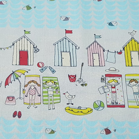 Cotton Beach Houses fabric - Summer-themed cotton fabric with drawings of colorful beach huts, girls and boys in towels, balls, umbrellas ... and some fringes that are repeated simulating the sea with light blue fish.