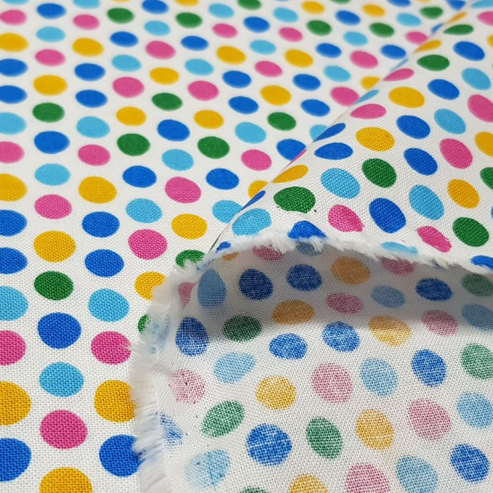 Tela Algodón Topos Multicolores - Tela de algodón ancho americano con dibujos de topos multicolor sobre un fondo blanco. La tela mide 110cm de ancho y su composición 100% algodón.