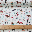 Tela Algodón Navidad Perruna Regalos Blanco - Tela de algodón navidad ancho americano con dibujos de perros con cuernos de reno, regalos, copos de hielo, lacitos… sobre un fondo blanco. La tela mide 110cm de ancho y su composición 100% algodón.
