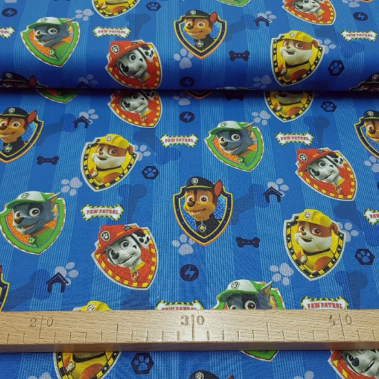 Tela Paw Patrol Cotton Blue - Children's cotton fabric with the characters of the Paw Patrol on a blue background. The fabric is 140cm wide and its composition 100% cotton
