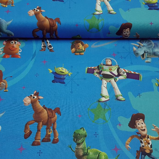 Algodón Disney Toy Story Azul - Tela de algodón Disney con los personajes de Toy Story sobre fondo azul. Tenemos a Buzz, Woody, el señor Potato y muchos más… La tela mide 140cm de ancho y su composición 100% algod