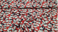 Tela Algodón Disney Mickey Fondo Rojo - Tela de algodón licencia Disney con dibujos del personaje Mickey sobre un fondo de color rojo. La tela mide 150cm de ancho y su composición 100% algodón.