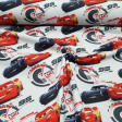 Tela Algodón Disney Cars Rayo y Jackson - Tela de algodón licencia Disney con dibujos de los personajes de la película Cars, Rayo McQueen y Jackson Storm en una carrera. La tela mide 145cm de ancho y su composición 100% algodón.