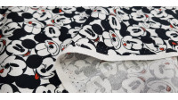 Tela Algodón Disney Mickey Caras Allover Blanco - Tela de algodón licencia Disney ancho americano con dibujos de caras de Mickey muy juntas y en varias posiciones sobre un fondo blanco. La tela mide 110cm de ancho y su composición 100% algodón.