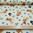 Tela Algodón Disney Bambi - Preciosa tela Disney de algodón con los dibujos de Bambi, Tambor y Flor sobre un fondo amarillo claro. También hay adornos de setas, ramas de árbol y pajaritos. La tela mide 110cm de ancho y su composición 100% algod