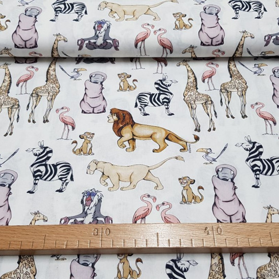 Cotton Disney Lion King fabric - Disney cotton fabric with the characters from the movie The Lion King. Several characters appear as Simba, Zazu, Nala, Rafiki... on a white background. The fabric is 150cm wide and its composition 100% cotton.