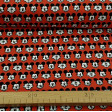 Cotton Disney Mickey Faces Red fabric - Disney licensed cotton fabric with drawings of Mickey faces making faces on a red background. The fabric is 110cm wide and its composition is 100% cotton.