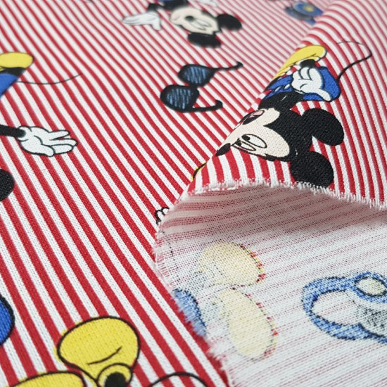 Tela Algodón Disney Mickey Gafas Rayas Rojas - Tela de algodón licencia Disney con dibujos del personaje Mickey con gafas de sol sobre un fondo de rayas rojas y blancas. La tela mide 140cm de ancho y su composición 100% algodón.