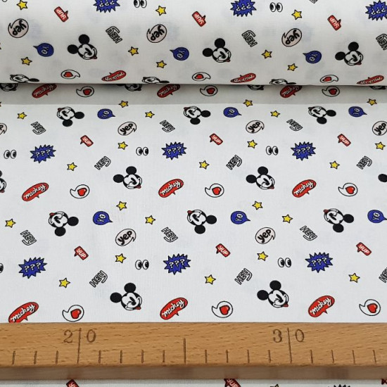 Cotton Disney Mickey Hey White fabric - Disney licensed cotton fabric with drawings of Mickey faces winking on a white background with stars, onomatopoeia and other symbols. The fabric is 110cm wide and its composition is 100% cotton.