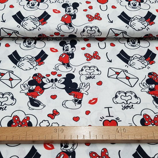 Cotton Disney Mickey Minnie Love Red fabric - Children's themed cotton fabric with Disney's Mickey and Minnie drawings and comic-style love decoration with drawings of kisses, hearts, love letters ... where the color red predominates. All on a white backg