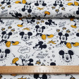 Tela Algodón Disney Mickey Plátanos - Tela de algodón licencia Disney con dibujos donde aparece Mickey que se ha resbalado con la piel de los plátanos. La tela mide 150cm de ancho y su composición 100% algodón. 