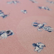 Cotton Disney Minnie Classic Petit fabric - Disney licensed poplin cotton fabric with small drawings of the Minnie character on a pink background with sparkles. The fabric measures 140cm wide and its composition is 100% cotton.