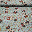 Cotton Disney Minnie Flowers Blue fabric - Children's cotton fabric with drawings of Disney's Minnie character on a flowered background where the light blue color predominates. The fabric is 140cm wide and its composition 100% cotton.