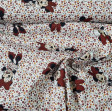 Tela Algodón Disney Minnie Flores Blanco - Tela de algodón infantil de licencia Disney con dibujos del personaje Minnie sobre un fondo floreado donde predomina el color blanco. La tela mide 140cm de ancho y su composición 100% algodón.