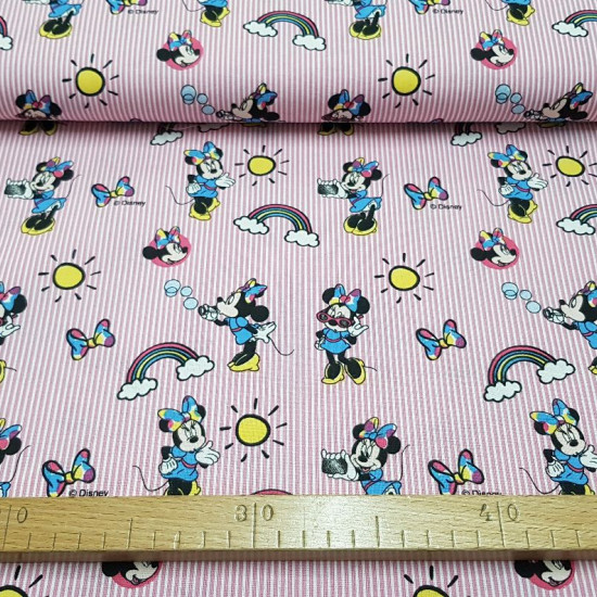 Cotton Disney Minnie Pink Stripes Glasses fabric - Disney licensed cotton fabric with drawings of the character Minnie on a background of pink and white stripes with rainbows, suns, colored bows... The fabric is 140cm wide and its composition is 100% cott