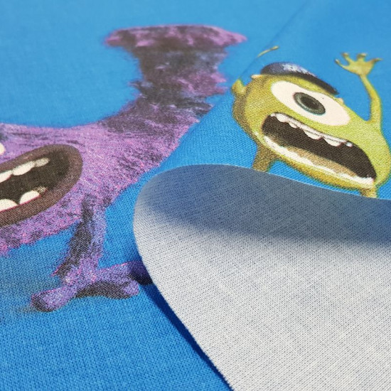 Cotton Disney Monsters University fabric - Decorative Disney licensed cotton fabric with large drawings of the characters from the movie Monsters University, on a blue background. The characters Sulley, Mike, appear among other monsters. The fabric is 140