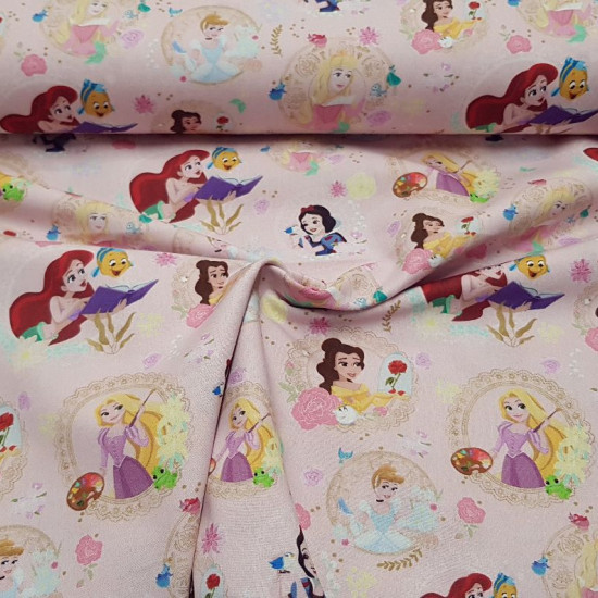 Cotton Disney Princesses Love Pink fabric - Disney licensed cotton fabric with the characters of Disney princesses SnowWhite, Cinderella, Rapuntzel, Aurora, Bella and Ariel on a pink background. The fabric is 150cm wide and its composition is 100% cotton.