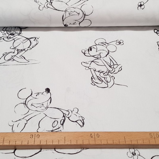 Cotton Disney Mickey Minnie Strokes fabric - Disney licensed cotton fabric with large line drawings of the characters Mickey and Minnie on a white background. The fabric is 150cm wide and its composition is 100% cotton.