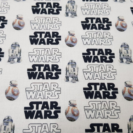 Cotton Star Wars Droids Logos fabric - Cotton fabric with drawings of the Star Wars logos in black and white and the droids R2-D2 and BB-8 on a white background. The fabric is 150cm wide and its composition is 100% cotton.