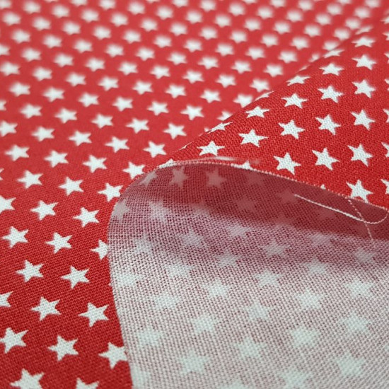 Cotton Tiny Stars Poppy fabric - Poplin cotton fabric with drawings of tiny stars on various backgrounds to choose from. The fabric is 150cm wide and its composition is 100% cotton.