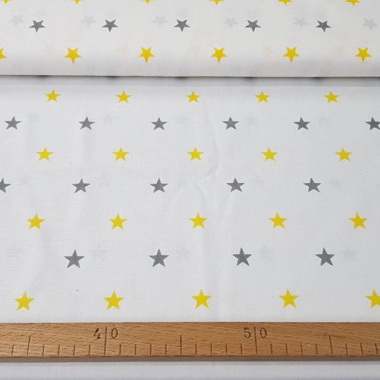 Cotton Stars Gray with Color fabric - Decorative cotton fabric with drawings of gray stars combining with various colors. An ideal fabric for children's-themed creations, decorations, accessories ... The fabric is 160cm wide and its composition is 10
