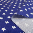 Cotton Medium Stars fabric - Cotton poplin fabric with drawings of medium stars on various backgrounds to choose from. The fabric is 150cm wide and its composition is 100% cotton.
