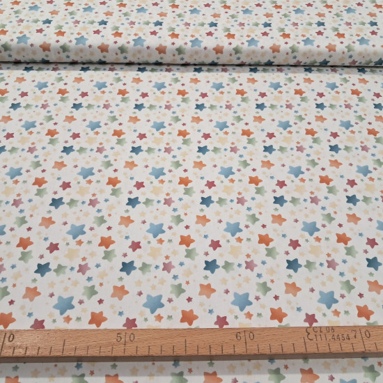 Cotton Multicolored Stars Illusion fabric Cotton Multicolored Stars Illusion fabric - Cotton poplin fabric with multicolored star patterns in a gradient effect on a white background. The fabric is 150 cm wide and is made of 100% cotton.