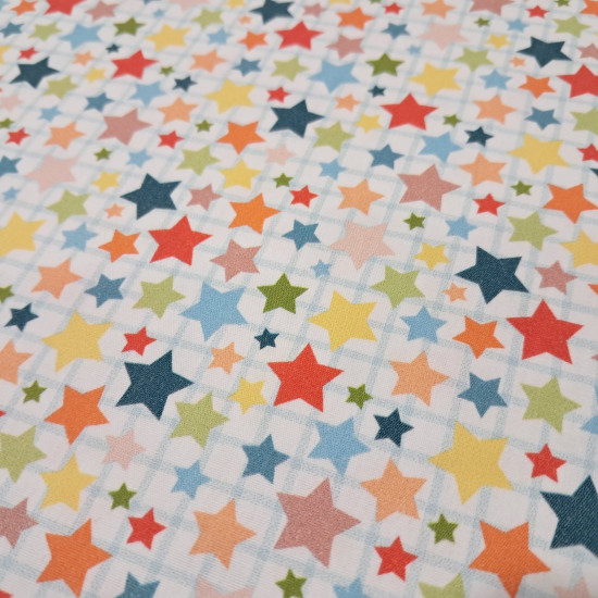 Tela Algodón Estrellas Colores Robotic Algodón Estrellas Colores Robotic - Tela de popelín algodón con dibujos de estrellas de colores en varios tamaños sobre un fondo de cuadrícula. La tela mide 150cm de ancho y su composición 100% algodón.