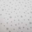 Cotton Shining Stars Silver fabric - Cotton fabric with drawings of bright silver stars on a white background. This fabric is perfect for Christmas-themed decorations, for example. The fabric is 150cm wide and its composition 100% cotton.