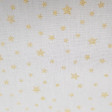 Cotton Gold Shiny Stars fabric - Cotton poplin fabric with bright gold stars pattern on white background. This fabric is ideal for Christmas-themed decorations, for example. The fabric is 150cm wide and its composition 100% cotton.