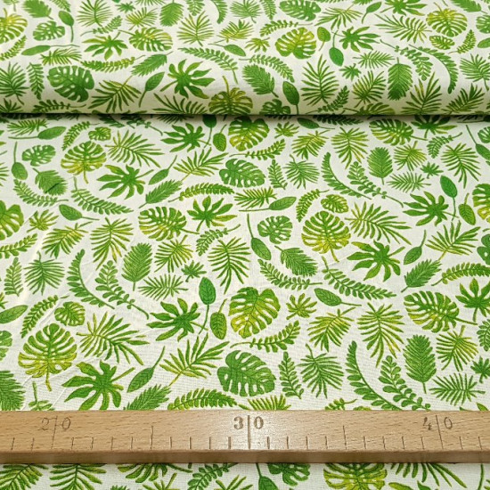 Cotton Green Leaves fabric - Decorative cotton fabric with drawings of green plant leaves on white background. Ideal for cushions, restaurant decorations, sachets ... The fabric is 160cm wide and has a 100% cotton composition.