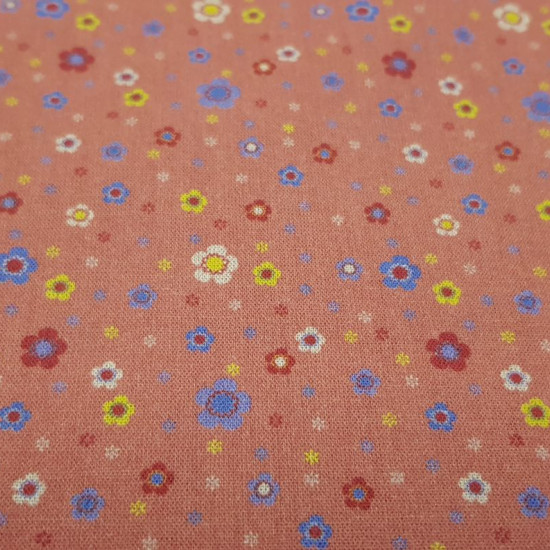 Cotton Flowers Daisies Colors Coral Background fabric - Ideal fabric for Patchwork of 100% cotton composition with drawings of flowers and daisies in colors and sizes on an orange coral background. The fabric is 150cm wide and its composition is 100% cott