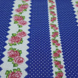 Cotton Roses and Polka Dots Blue fabric - Cotton fabric with border patterns with roses and white polka dots on a blue background. The fabric is 140cm wide and its composition is 100% cotton.